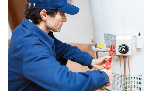 Water Heater Big Changes - plumber fixing image