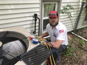 Bonfe Tech working on AC unit outside