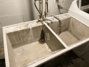 A dirty commercial sink