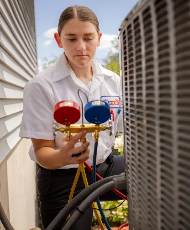 Bonfe Service Tech working on home HVAC