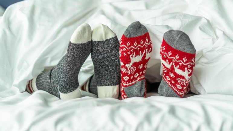 Holiday socks in bed