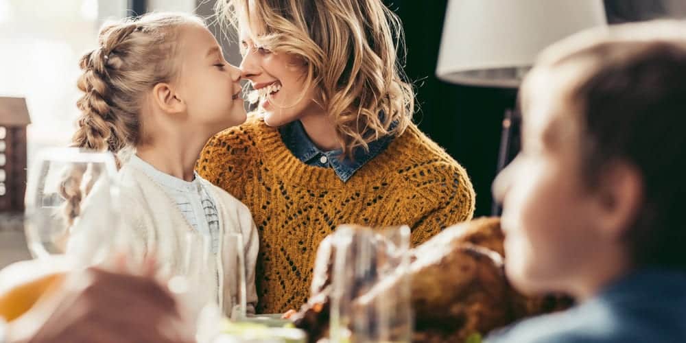 Child and mother laughing