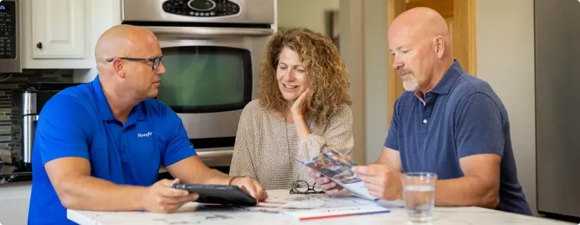 Bonfe technician meeting with homeowner about membership plans